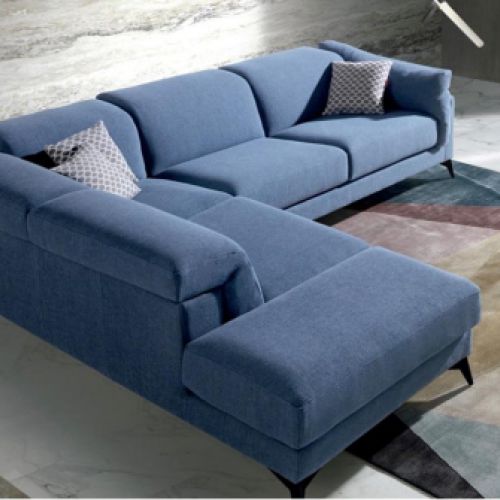 Sofá esquinero en color azul con cheslong